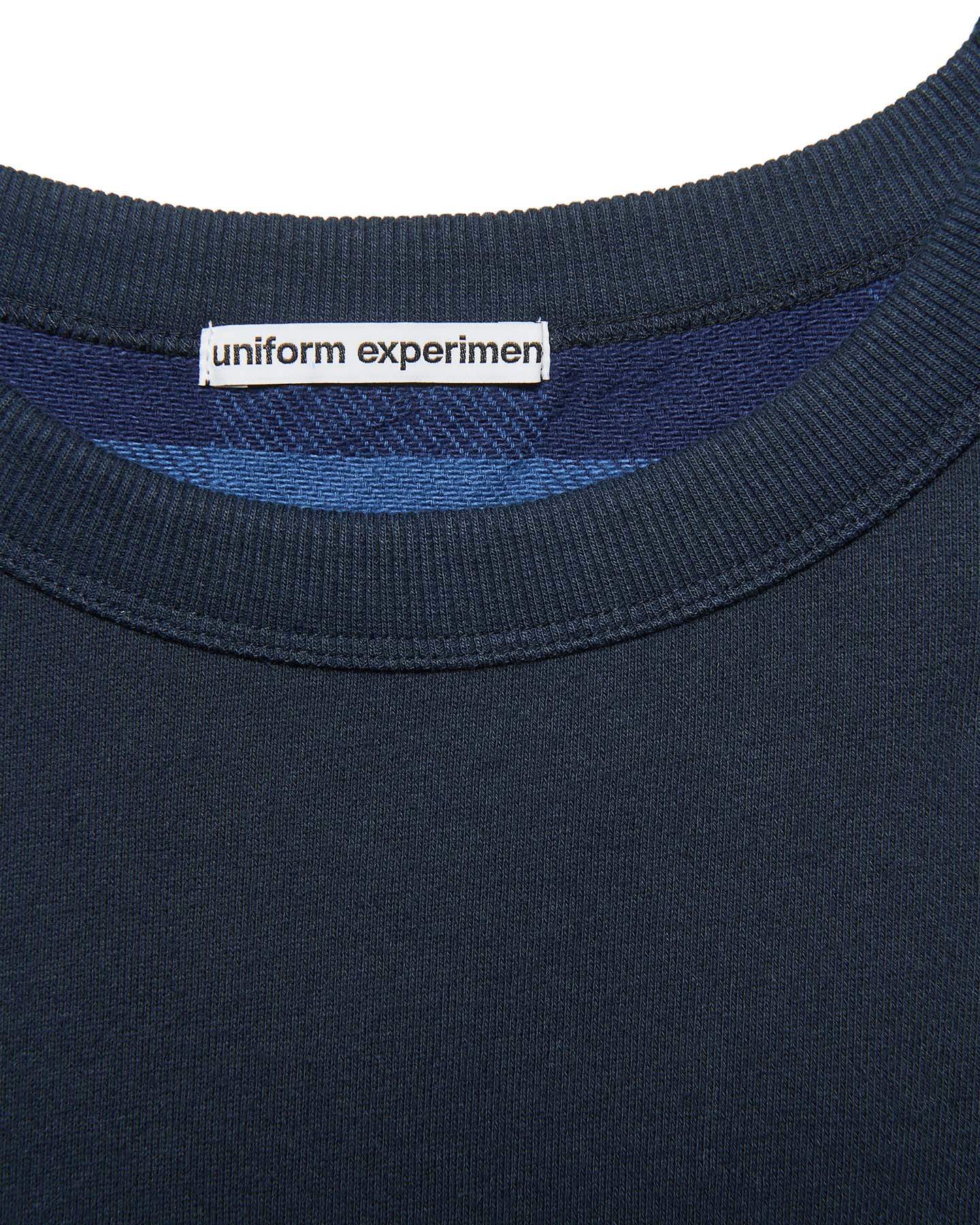 uniform experiment / LINE FLANNEL CHECK PANELED CREWNECK TOP (Blue)襟